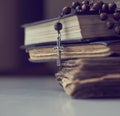 The rosary beads on Catholic Church liturgy books. Royalty Free Stock Photo