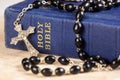 Rosary beads, cross and Bible Royalty Free Stock Photo