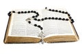 Rosary beads, cross and Bible