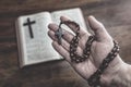 Rosary Beads and Holy Bible in church, faith, spirtuality and religion Royalty Free Stock Photo