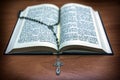 Rosary beads and a holy bible Royalty Free Stock Photo