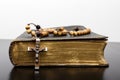 Rosary beads and prayer book