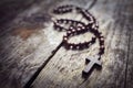 Rosary beads and religious crucifix cross background Royalty Free Stock Photo