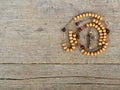 Rosary beads on the table Royalty Free Stock Photo