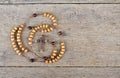 Rosary beads on the table Royalty Free Stock Photo