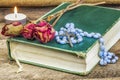 Rosary, bible, rose on the table Royalty Free Stock Photo