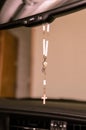 Rosary on car mirror Royalty Free Stock Photo