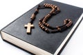 Rosary catholic cross on holyBible Royalty Free Stock Photo