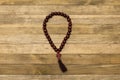 Rosary cross on dark wood