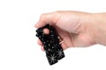 Rosary in hand on a white background isolated Royalty Free Stock Photo