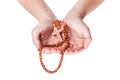 Rosary in hands, religious background Royalty Free Stock Photo