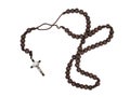 Rosary isolated on white background. Christian cross, crucifix, wooden beads. Royalty Free Stock Photo