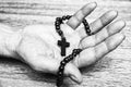 Rosary in open hand