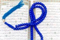 Rosary and Qoran Royalty Free Stock Photo