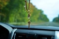 Rosary Hanging From Car Rearview Mirror Royalty Free Stock Photo