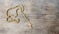 Rosary on wooden table