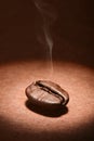 Rosated Turkish coffee bean with smoke Royalty Free Stock Photo