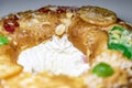 RoscÃÂ³n. Roscon de Reyes. Kingcake. Bun made with a sweet dough in the shape of a toroid decorated Royalty Free Stock Photo