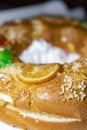 RoscÃÂ³n. Roscon de Reyes. Kingcake. Bun made with a sweet dough in the shape of a toroid decorated Royalty Free Stock Photo