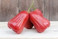 Rose apple put down a wooden table Royalty Free Stock Photo