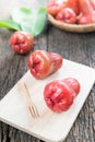 Rose apple on wood plate Royalty Free Stock Photo