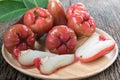 Rose apple on wood plate Royalty Free Stock Photo