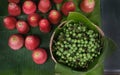 Rose apples and devil`s fig in a market stall Royalty Free Stock Photo