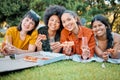 A rose can be my garden, a friend, my world. a group of friends having champagne and pizza in a park. Royalty Free Stock Photo