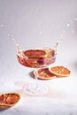 Rose champagne splashing on a light background Royalty Free Stock Photo