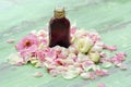 Rose essential oil and flowers petals for Spa treatments