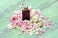 Rose essential oil and flowers petals for Spa treatments