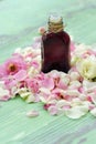 Rose essential oil and flowers petals for Spa treatments