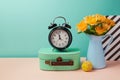 Rose flower bouquet and alarm clock still life