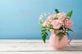 Rose flower bouquet in pink vase over wooden background