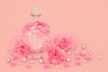 Rose Flower Perfume with Pink Roses Pearls and Petals Royalty Free Stock Photo