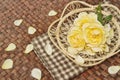 Rose flowers decorate on wooden surface.