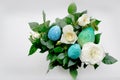 rose flowers with multi-colored Easter eggs Royalty Free Stock Photo