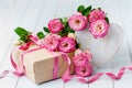 Rose Flowers, Wooden Heart And Gift Box On Blue Rustic Table. Beautiful Greeting Card For Birthday, Woman Or Mothers Day.