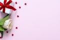 Rose, gift box and heart on pink background with copyspace for text. Top view of valentine`s day or love frame concept Royalty Free Stock Photo