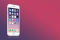 Rose Gold Apple iPhone 7 with iOS 10 on the screen on pink gradient background with copy space Royalty Free Stock Photo