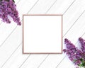 Rose gold frame mockup on a wooden painted white background. 1x1 Square