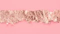 Rose gold paper strip torn on pink background, copy space, art design Royalty Free Stock Photo