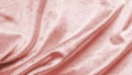 Rose gold pink velvet background or velour flannel texture made of cotton or wool with soft fluffy velvety satin fabric cloth