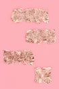 Rose gold scraps on pink background, copy space, design template Royalty Free Stock Photo