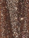 Rose gold sparkle glitter background. Crumpled fabric with glittering sequins texture Royalty Free Stock Photo