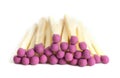 Rose head matchsticks pile close-up. White background, selective focus Royalty Free Stock Photo