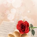 The rose on notebooks with notes