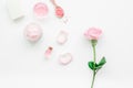 rose organic cosmetics with salt, cream and oil on white table background top view mock up Royalty Free Stock Photo