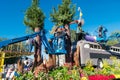 Workers prepare floral float for Rose Parade