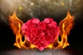 Rose petals heart shape with blaze fire flame on wooden deck